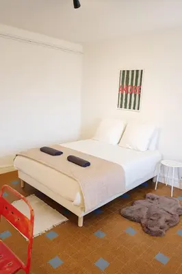 Un ou plusieurs lits dans un hébergement de l'établissement Grand appartement 3 chambres Wifi & Parking