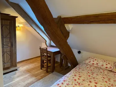 Un ou plusieurs lits dans un hébergement de l'établissement Auberge du Vieux Brancion