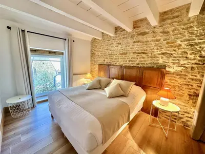 Coin salon dans l'établissement Clos de Fougères - La Grange 4-5 personnes