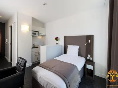 Cuisine ou kitchenette dans l'établissement Adonis Dijon single apartment