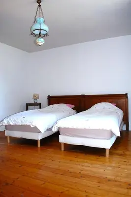 Un ou plusieurs lits dans un hébergement de l'établissement La maison de l etang