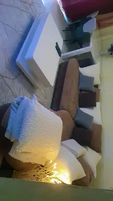 Coin salon dans l'établissement Joli appartement de 2 chambres au centre-ville