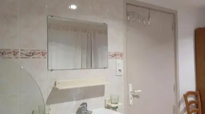 Salle de bains dans l'établissement Chez Flo