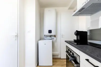 Cuisine ou kitchenette dans l'établissement Le Nido - stationnement privé gratuit