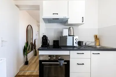 Cuisine ou kitchenette dans l'établissement Le Nido - stationnement privé gratuit