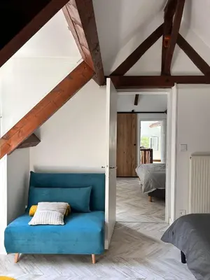 Un ou plusieurs lits dans un hébergement de l'établissement Maison aux portes de Dijon à la campagne