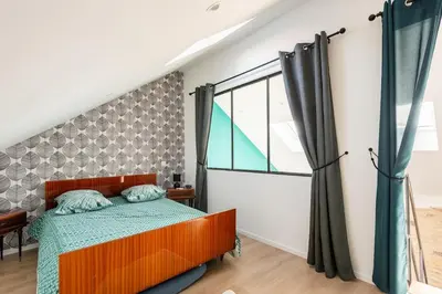 Un ou plusieurs lits dans un hébergement de l'établissement Loft antique