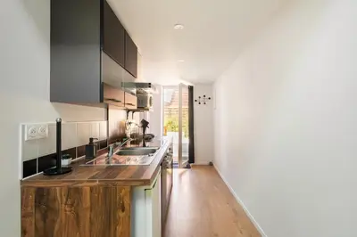 Cuisine ou kitchenette dans l'établissement Loft antique