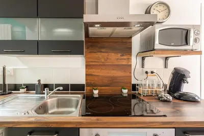Cuisine ou kitchenette dans l'établissement Loft antique
