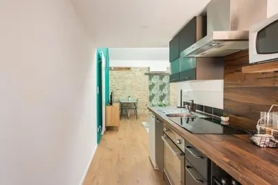 Cuisine ou kitchenette dans l'établissement Loft antique