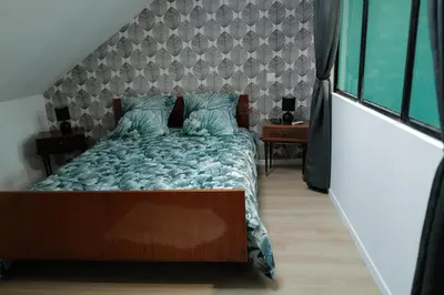 Un ou plusieurs lits dans un hébergement de l'établissement Loft antique
