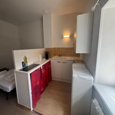 Cuisine ou kitchenette dans l'établissement Studio Le Verdun et La République