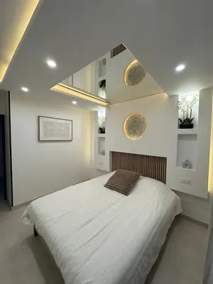 Un ou plusieurs lits dans un hébergement de l'établissement Au Clair de Lune Luxury and modernity