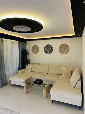 Coin salon dans l'établissement Au Clair de Lune Luxury and modernity