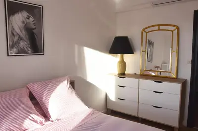 Un ou plusieurs lits dans un hébergement de l'établissement La Maison des Vignes à 5 minutes de l A6 & Macon