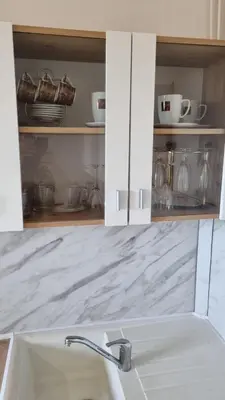 Cuisine ou kitchenette dans l'établissement De Manhattan à la savane