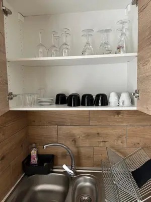 Cuisine ou kitchenette dans l'établissement Maison f3 neuve et climatisée