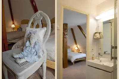 Un ou plusieurs lits dans un hébergement de l'établissement Nuits et Jardin