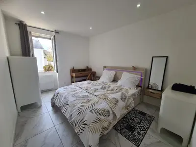Un ou plusieurs lits dans un hébergement de l'établissement Rive gauche Rive droite Appartements Cosy très bien situés