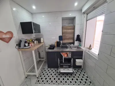 Cuisine ou kitchenette dans l'établissement Rive gauche Rive droite Appartements Cosy très bien situés
