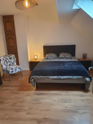 Un ou plusieurs lits dans un hébergement de l'établissement Maison de campagne