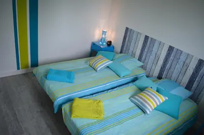 Un ou plusieurs lits dans un hébergement de l'établissement Gîte La Cabotte Rullyotine