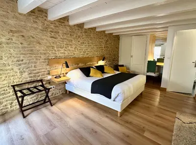 Un ou plusieurs lits dans un hébergement de l'établissement Clos de Fougères - Cocon