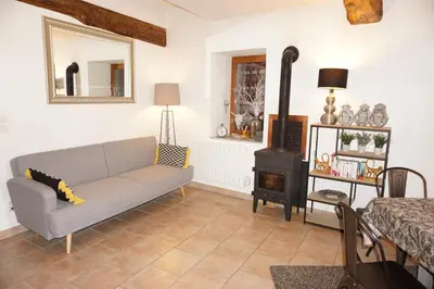 Coin salon dans l'établissement La Ferme de la Bergerie