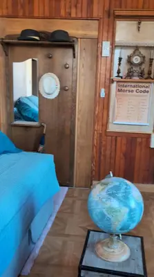 Un ou plusieurs lits dans un hébergement de l'établissement La chambre du temps - Appartement Escape game