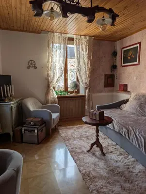 Coin salon dans l'établissement La chambre du temps - Appartement Escape game
