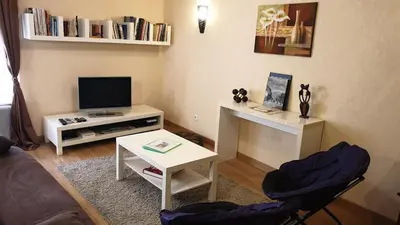 Télévision ou salle de divertissement dans l'établissement Gîte le Lynx