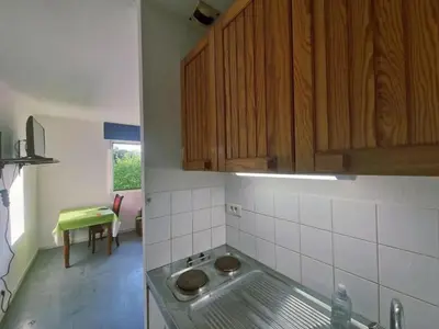 Cuisine ou kitchenette dans l'établissement Studio confortable avec vue sur la ville à Dole, 25 m²
