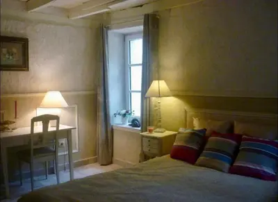 Un ou plusieurs lits dans un hébergement de l'établissement Gîte Laure et Henri
