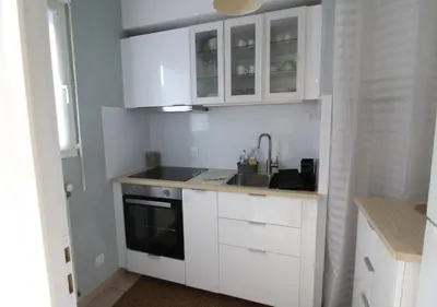 Cuisine ou kitchenette dans l'établissement Escapade Jurassienne-Terrasse & Sérénité