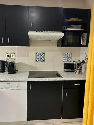 Cuisine ou kitchenette dans l'établissement Appartement détente, piscine - sauna - vue sur le golf