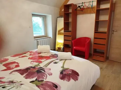 Un ou plusieurs lits dans un hébergement de l'établissement Maison de vacances à la campagne