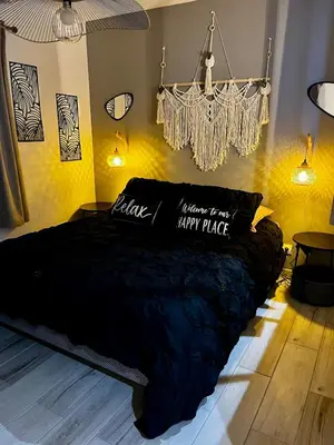 Un ou plusieurs lits dans un hébergement de l'établissement Maison chic et paisible, terrasse, spa et campagne