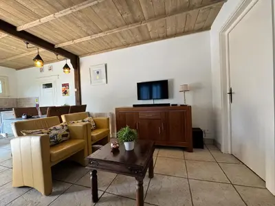 Télévision ou salle de divertissement dans l'établissement Maison Annelore