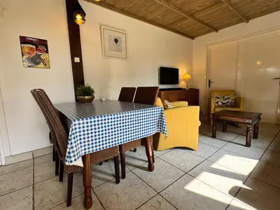 Télévision ou salle de divertissement dans l'établissement Maison Annelore