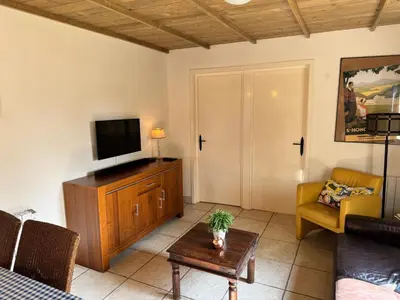 Télévision ou salle de divertissement dans l'établissement Maison Annelore
