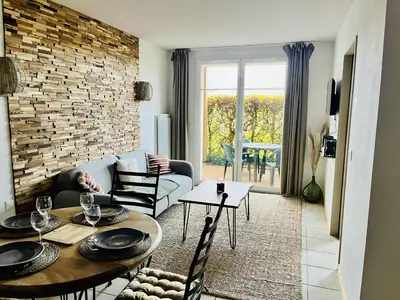 Coin salon dans l'établissement Le Clos du Green