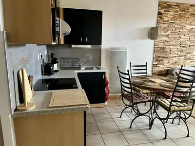 Cuisine ou kitchenette dans l'établissement Le Clos du Green