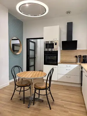 Cuisine ou kitchenette dans l'établissement La Chouette