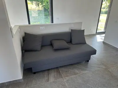 Coin salon dans l'établissement Appartement indépendant jusqu'à 10 personnes