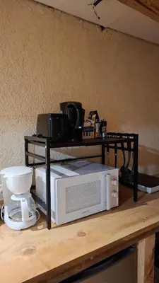 Cuisine ou kitchenette dans l'établissement Le Grenier du Moulin