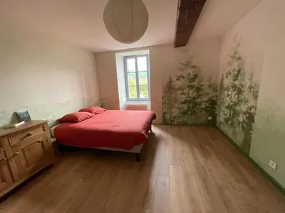 Un ou plusieurs lits dans un hébergement de l'établissement Cense des Possibles - chambre Forêt 4 personnes