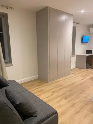 Télévision ou salle de divertissement dans l'établissement Villa du Parc de Scey