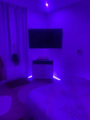 Un ou plusieurs lits dans un hébergement de l'établissement Appartement Jacuzzi proche Cité Gastronomique