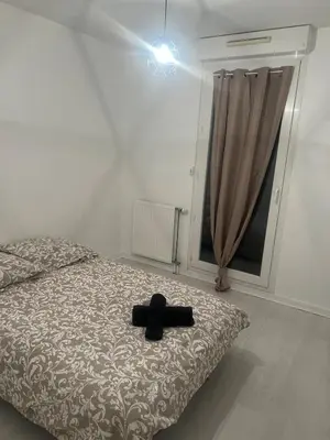 Un ou plusieurs lits dans un hébergement de l'établissement Appartement Toison d'Or