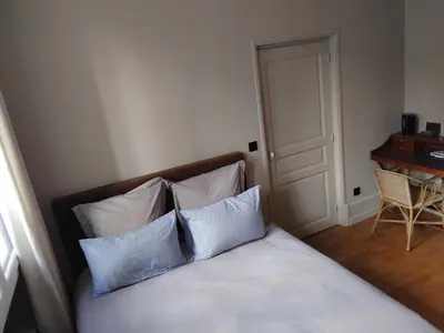 Un ou plusieurs lits dans un hébergement de l'établissement Suite confortable plein cœur du village
